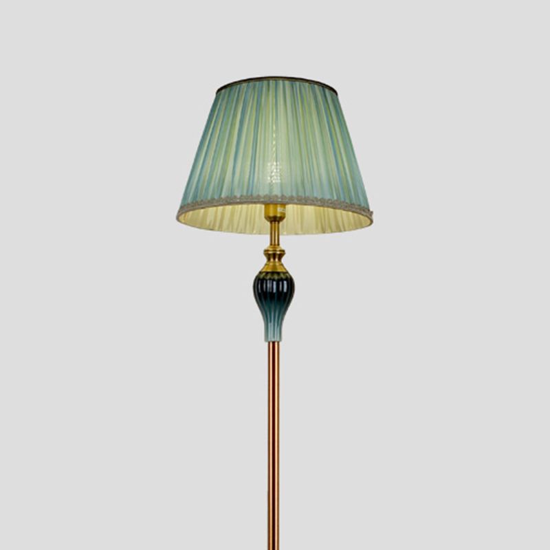 Floor lamp with fabric dome shade and metal base, available in multi colour options for bedroom