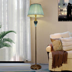 Floor lamp with fabric dome shade and metal base, available in multi colour options for bedroom