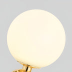 Hand-blown glass table lamp Nordic style, frosted globe on metal base, gold and black finish