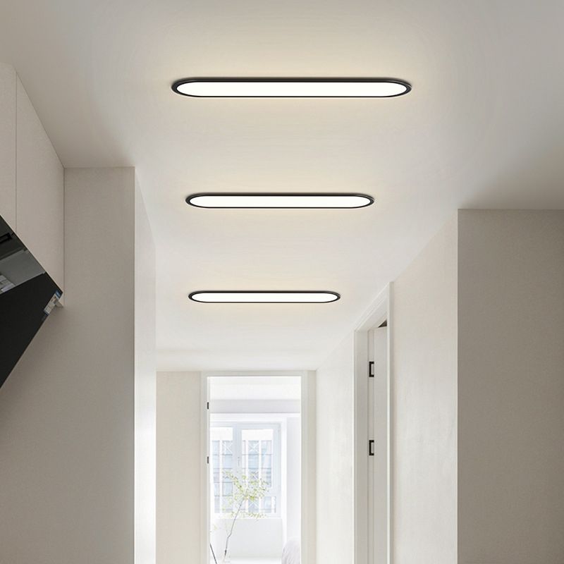 Oval ceiling light flush mount in metal and acrylic, modern indoor LED design