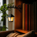 Bookshelf light with decorative mini pendant and wrought iron bracket, warm white cordless