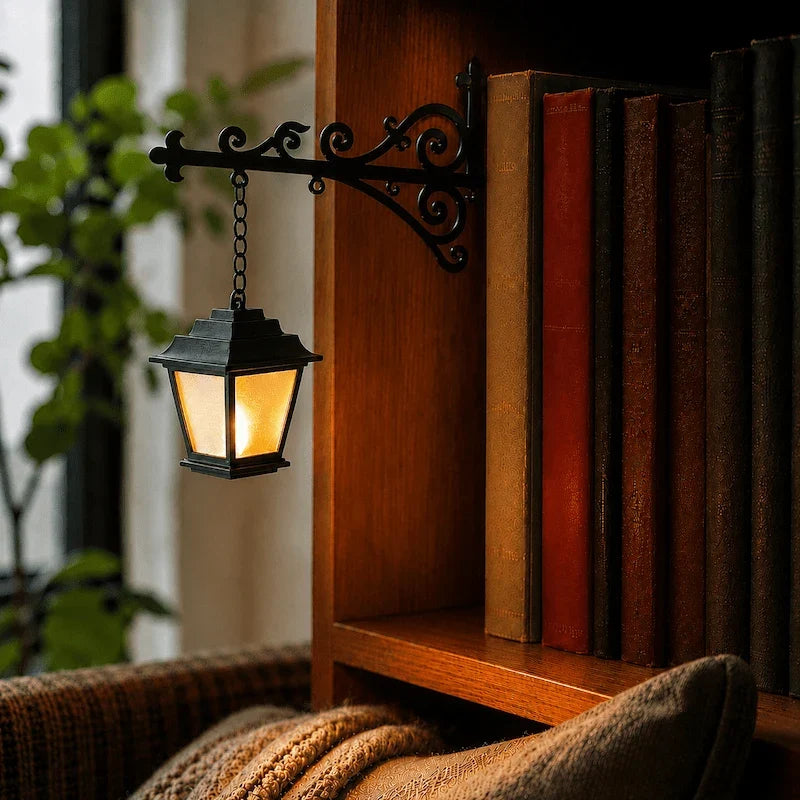 Bookshelf light with decorative mini pendant and wrought iron bracket, warm white cordless