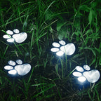 Solar paw print outdoor garden light, waterproof IP44, LED warm white glow