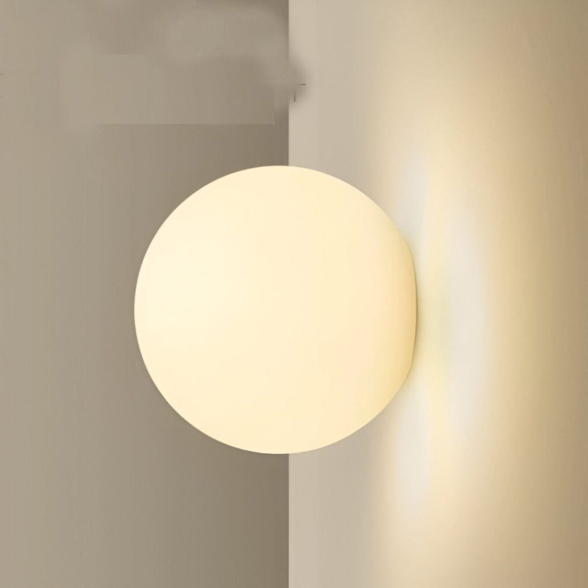 Modern glass wall light with warm LED glow, hardwired, matte glass finish for living room and bedroom