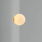 Modern glass wall light with warm LED glow, hardwired, matte glass finish for living room and bedroom