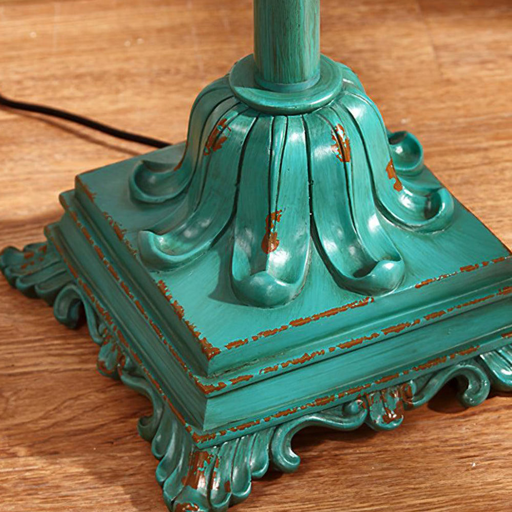 Vintage green floor lamp with metal and resin base, warm brown cotton-linen shade, living room
