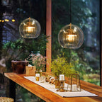 Glass globe pendant light in clear and amber, Nordic style ceiling fixture