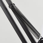 Adjustable LED table lamp with clip-on base and flexible arm, minimalist metal design