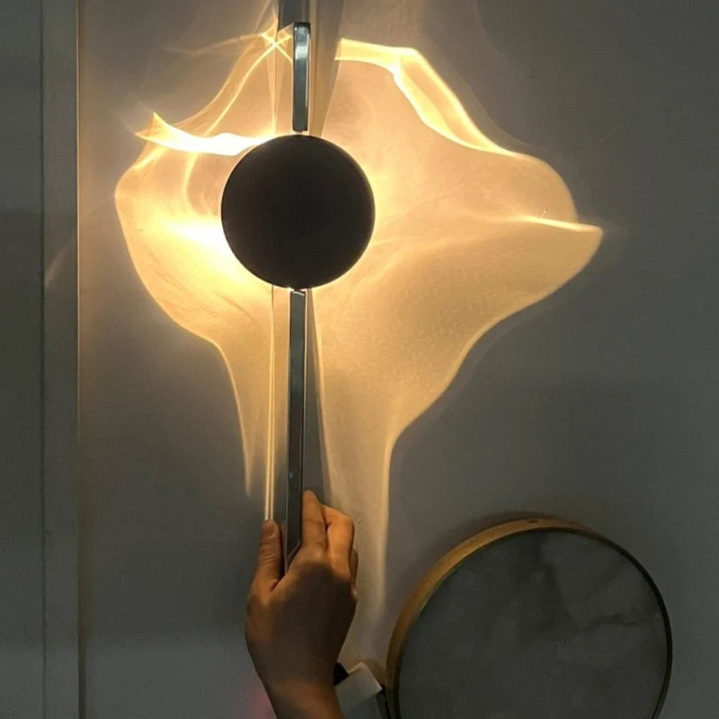 Wall sconce with ripple light effect, 180° rotatable, aluminum warm white, modern minimalist