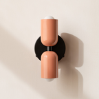 Modern minimalist cylinder LED wall sconce, 2-light iron fixture with warm white glow