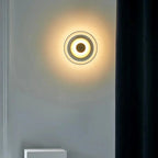 Round wall sconce with brass and glass shade, minimalist LED 1-light indoor fixture