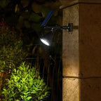 Solar garden spotlight with 9 color modes, IP55 weatherproof, 90° adjustable panel