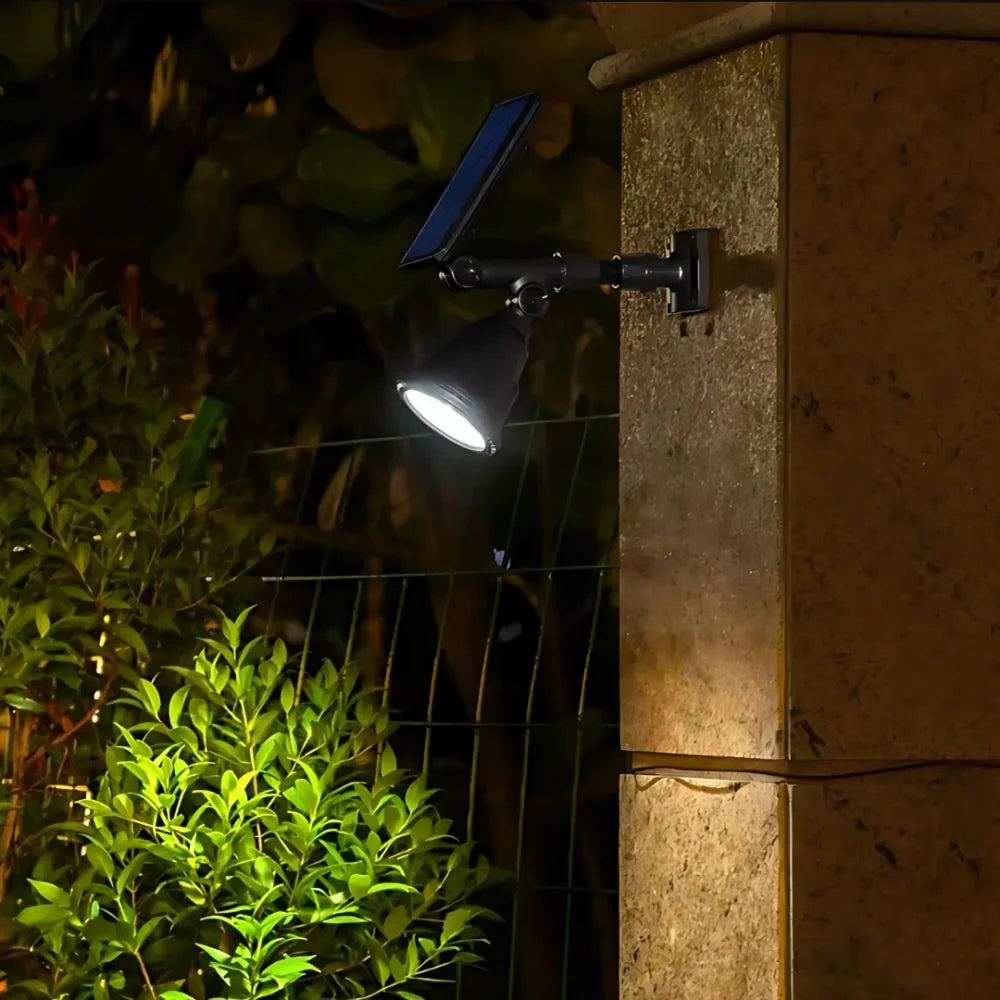 Solar garden spotlight with 9 color modes, IP55 weatherproof, 90° adjustable panel