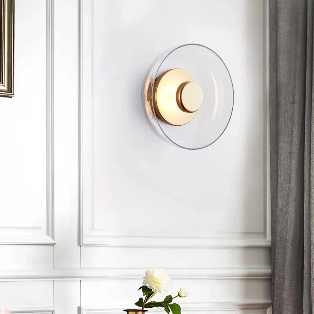 Round wall sconce with brass and glass shade, minimalist LED 1-light indoor fixture