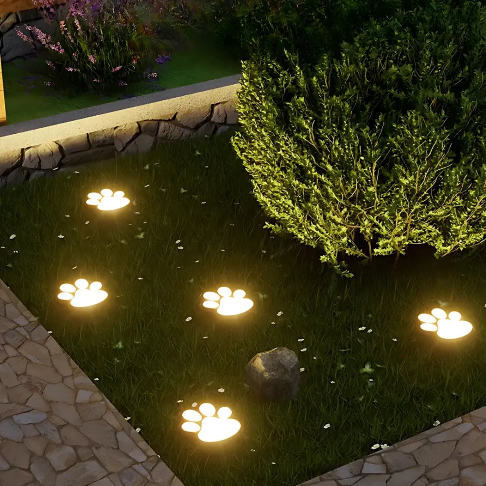 Solar paw print outdoor garden light, waterproof IP44, LED warm white glow