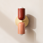Modern minimalist cylinder LED wall sconce, 2-light iron fixture with warm white glow