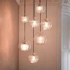 Glass globe pendant light in clear and amber, Nordic style ceiling fixture