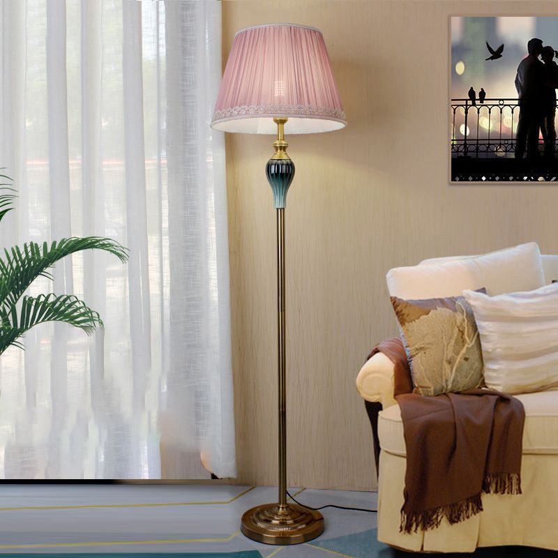 Floor lamp with fabric dome shade and metal base, available in multi colour options for bedroom