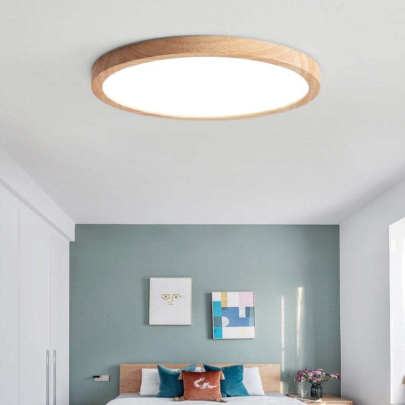 Slim round LED ceiling light with Japanese-inspired wood accent finish, flush mount
