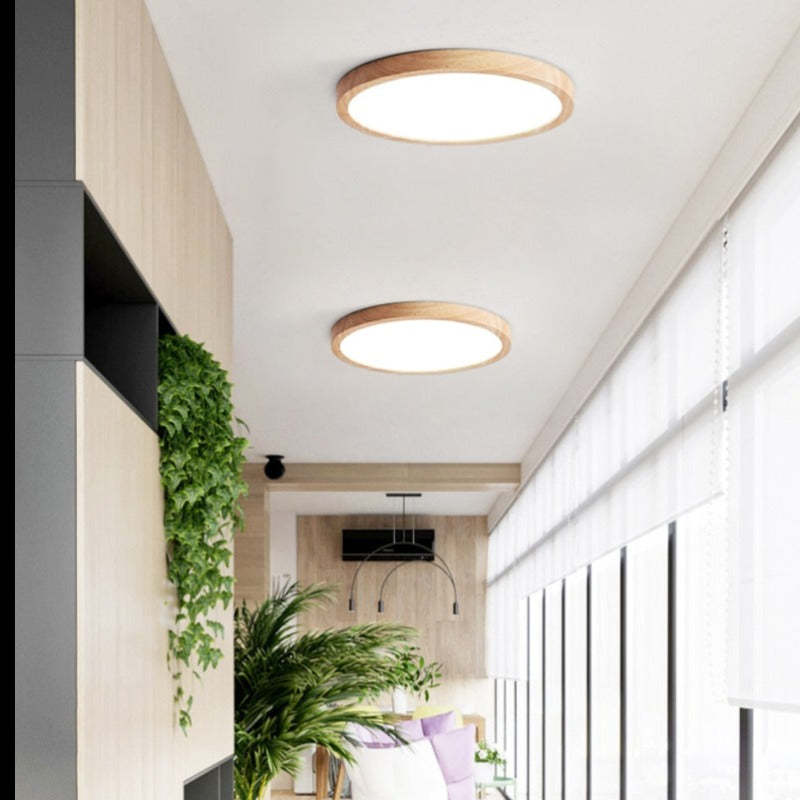 Slim round LED ceiling light with Japanese-inspired wood accent finish, flush mount