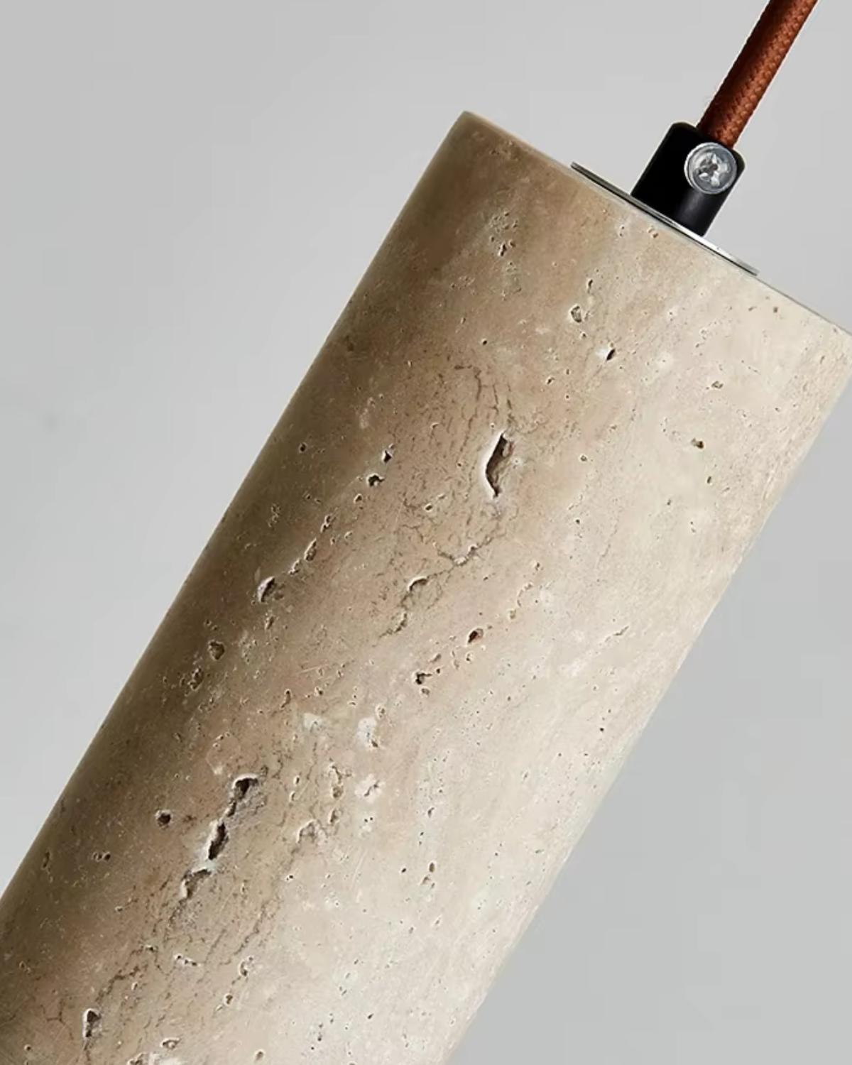 Travertine pendant light minimalist cylinder natural stone warm ambient glow