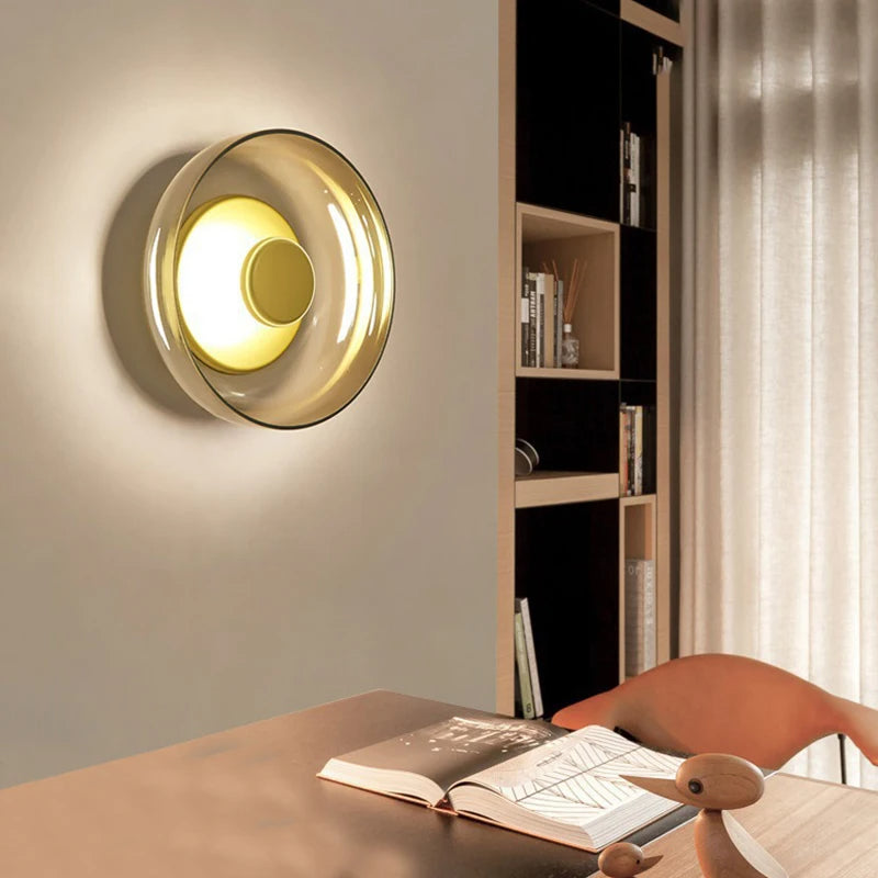 Round wall sconce with brass and glass shade, minimalist LED 1-light indoor fixture