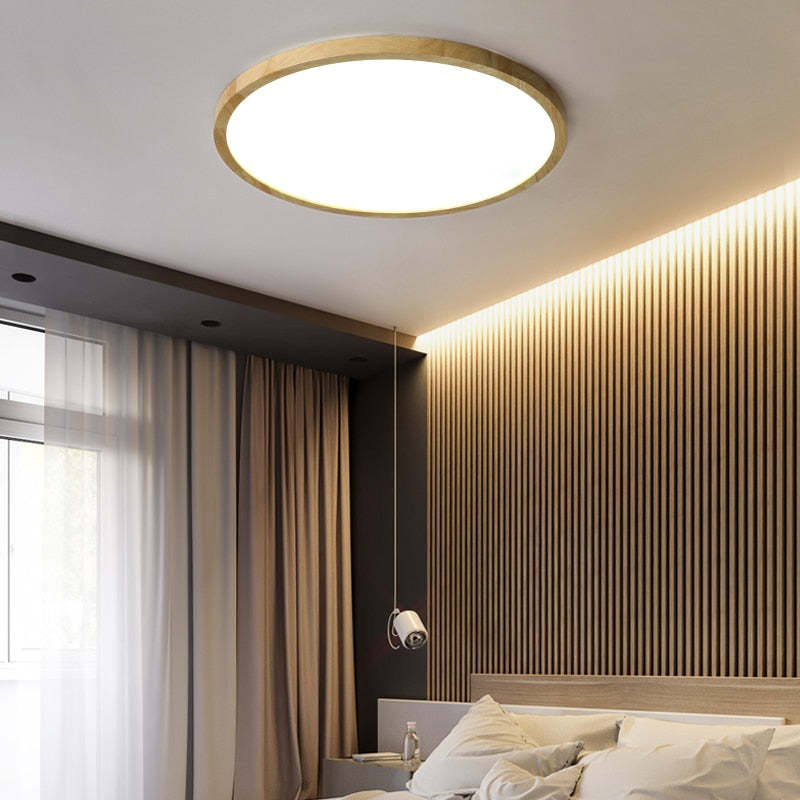 Slim round LED ceiling light with Japanese-inspired wood accent finish, flush mount