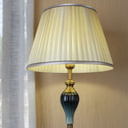 Floor lamp with fabric dome shade and metal base, available in multi colour options for bedroom