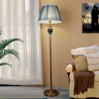 Floor lamp with fabric dome shade and metal base, available in multi colour options for bedroom