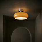 Flush mount ceiling light with vintage amber glass shade and brass canopy, E27 pendant