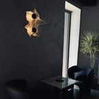 Wall sconce with ripple light effect, 180° rotatable, aluminum warm white, modern minimalist