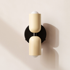Modern minimalist cylinder LED wall sconce, 2-light iron fixture with warm white glow