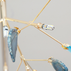 Branch-style glass chandelier with adjustable suspension and metal arms, three sizes