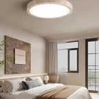 Flush mount ceiling light with travertine finish, slim profile, round LED, three sizes