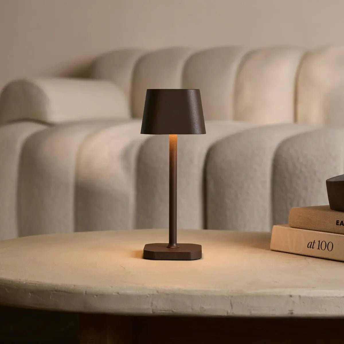 Rechargeable table lamp brown metal, cordless and dimmable oval design