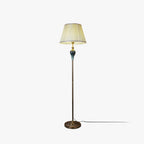 Floor lamp with fabric dome shade and metal base, available in multi colour options for bedroom