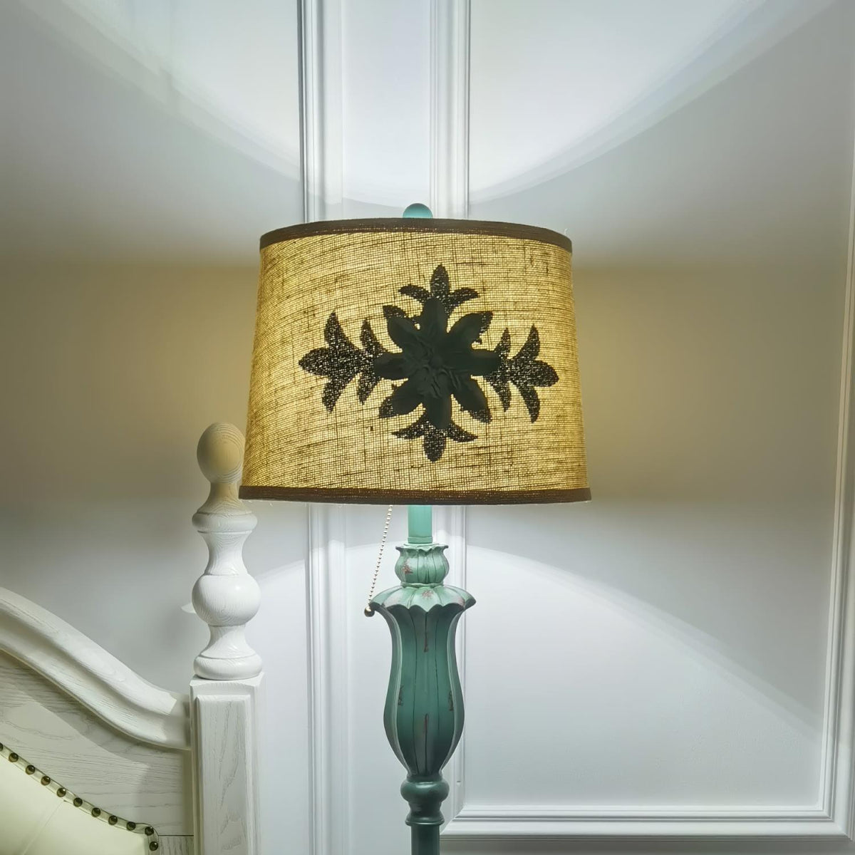 Vintage green floor lamp with metal and resin base, warm brown cotton-linen shade, living room