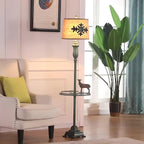 Vintage green floor lamp with metal and resin base, warm brown cotton-linen shade, living room