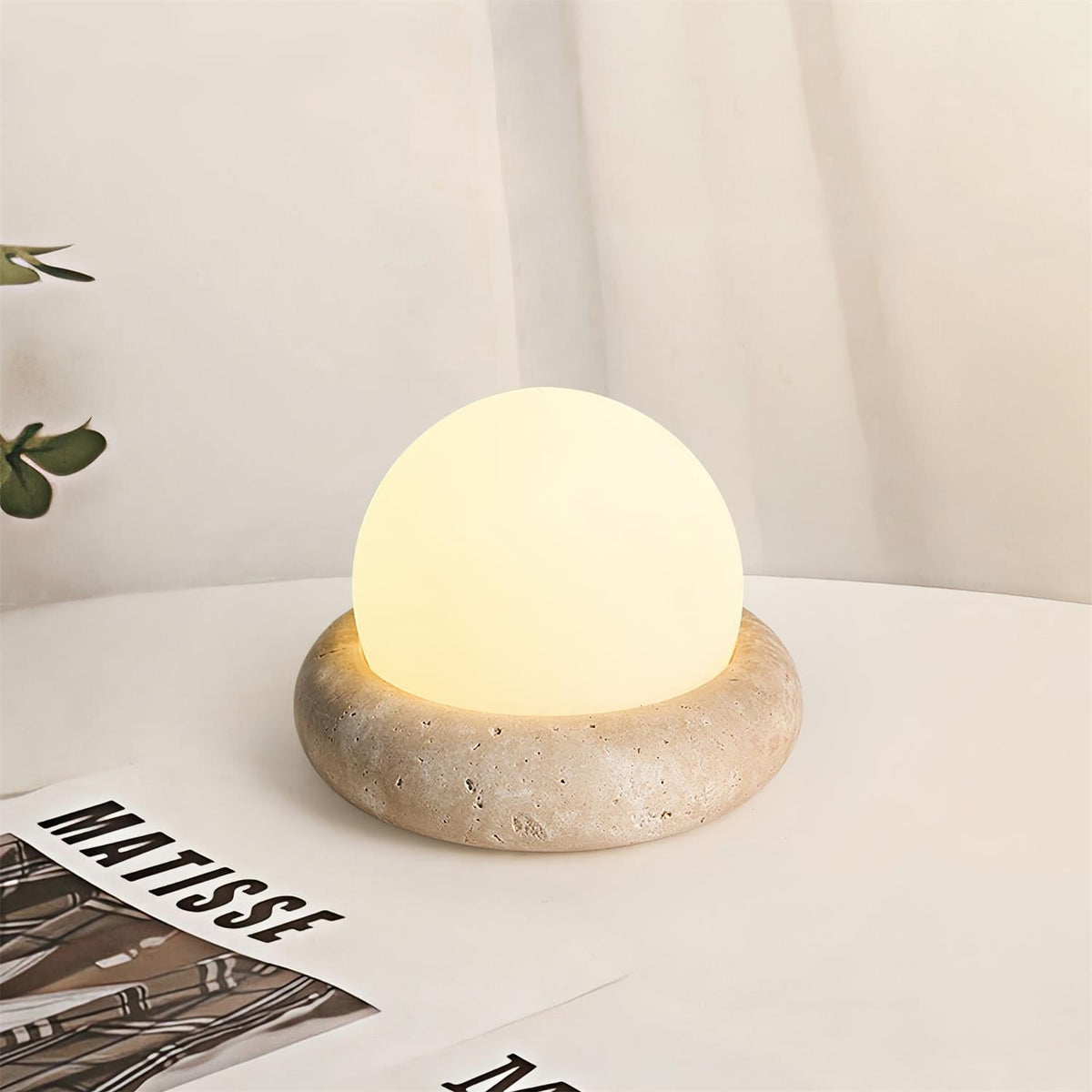 Travertine table lamp with opal glass globe, beige natural stone base, USB rechargeable LED