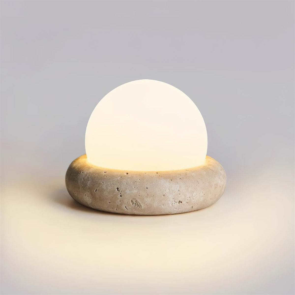 Travertine table lamp with opal glass globe, beige natural stone base, USB rechargeable LED