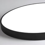 Low profile round LED ceiling light with acrylic diffuser and minimal frame