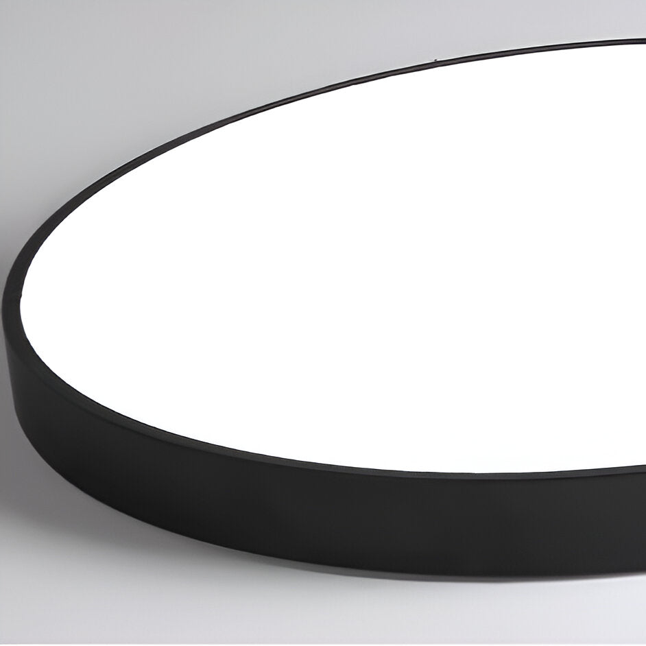 Low profile round LED ceiling light with acrylic diffuser and minimal frame