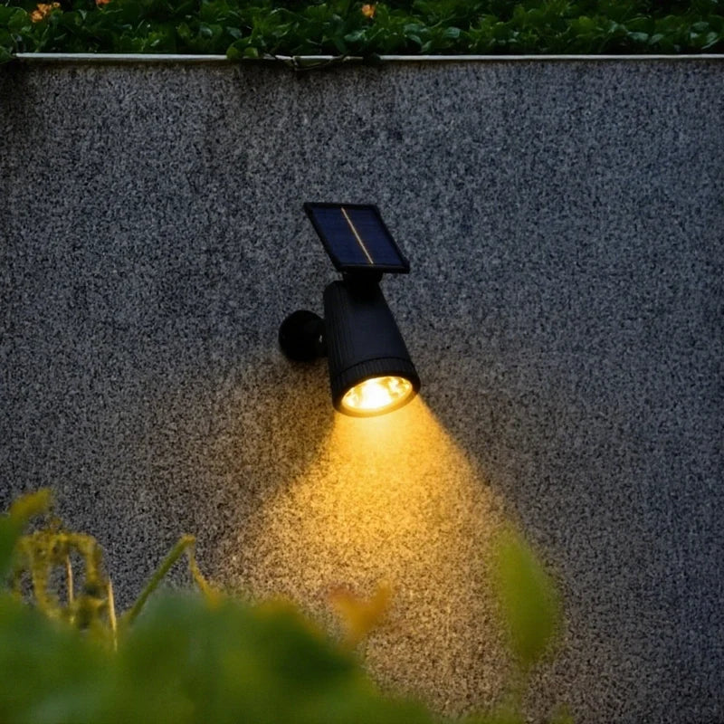 Solar garden spotlight with 9 color modes, IP55 weatherproof, 90° adjustable panel