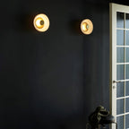 Round wall sconce with brass and glass shade, minimalist LED 1-light indoor fixture