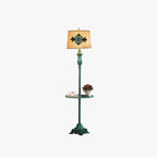 Vintage green floor lamp with metal and resin base, warm brown cotton-linen shade, living room