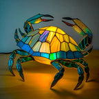 Stained glass animal table lamp with vibrant coloured glass panels and warm ambient light