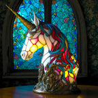 Stained glass animal table lamp with vibrant coloured glass panels and warm ambient light