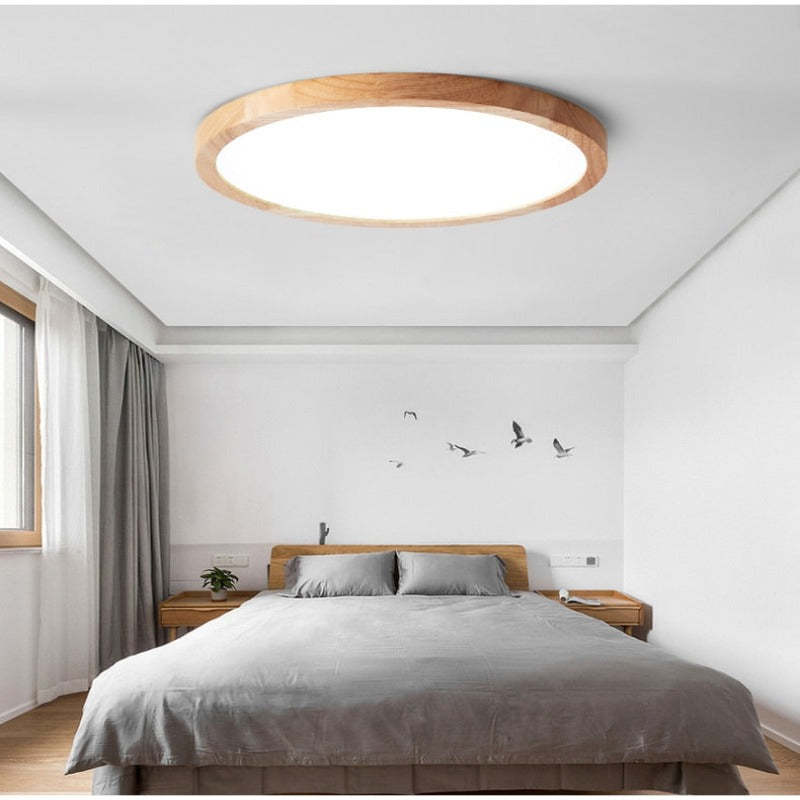 Slim round LED ceiling light with Japanese-inspired wood accent finish, flush mount
