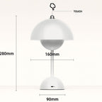 Cordless table lamp with modern dome design, rechargeable LED and touch control