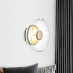 Round wall sconce with brass and glass shade, minimalist LED 1-light indoor fixture